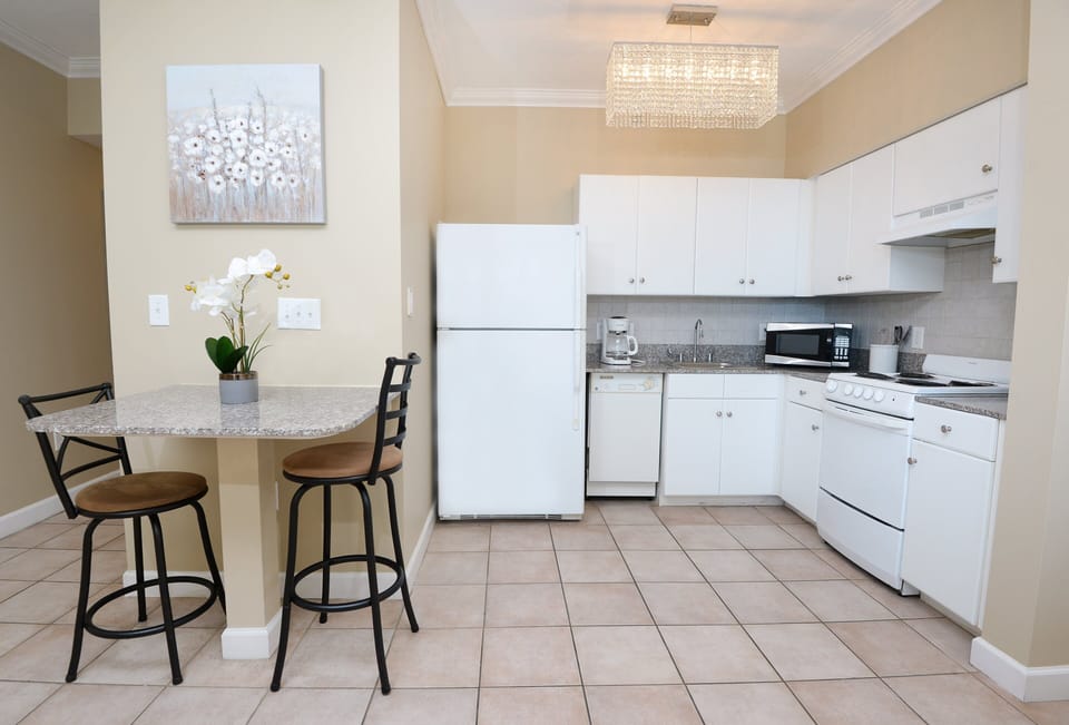 Full kitchen-Refrigerator, Dishwasher, standard coffee pot, Microwave, Stove
Dining table for 2