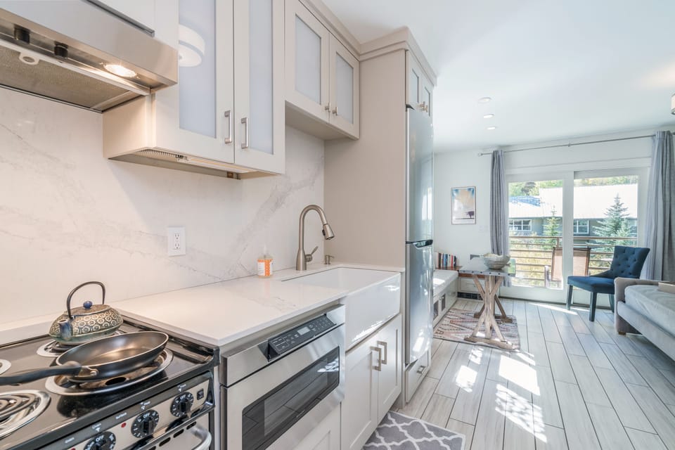 The kitchen blends seamlessly into the dining area, so you can easily gather.