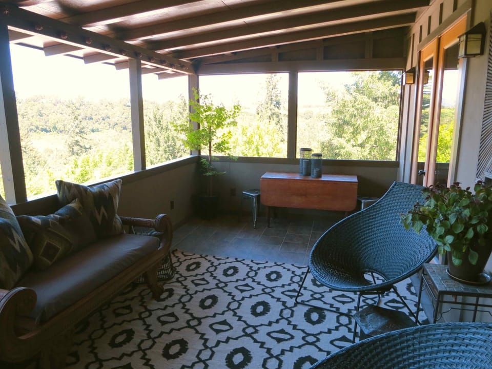 Seating area on porch. This is everybody's favorite place to lounge!