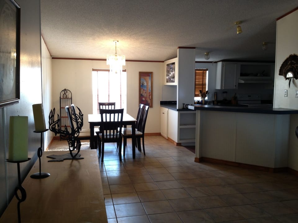 dining area with seating for 6 at the dinner table.