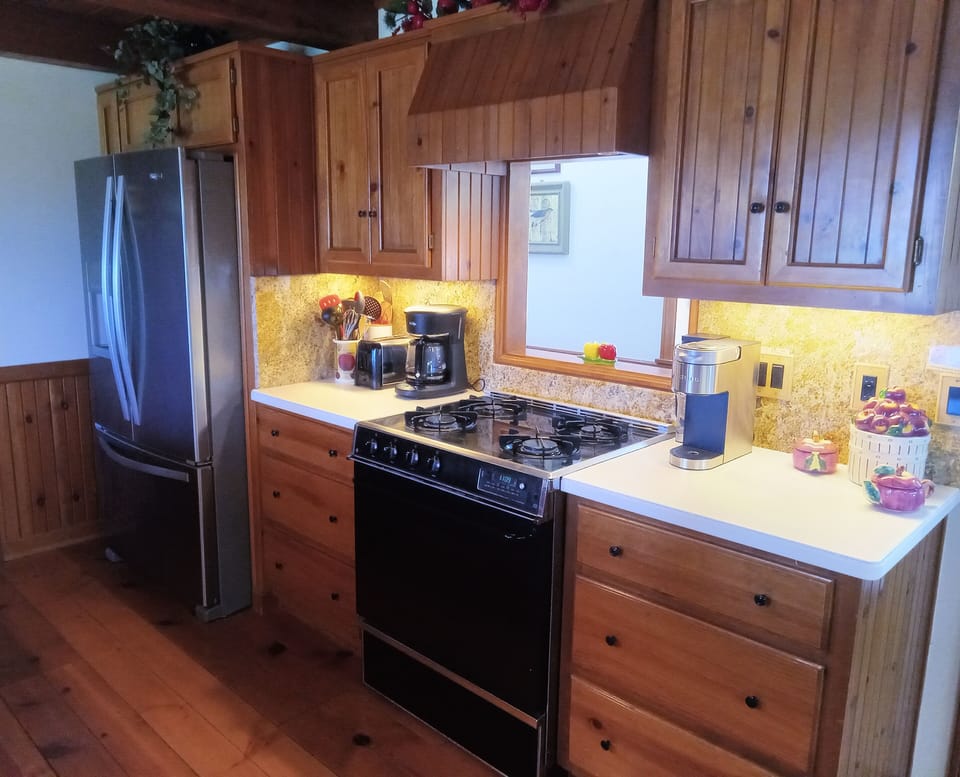 Kitchen counter area featuring Keurig and traditional drip coffeemaker