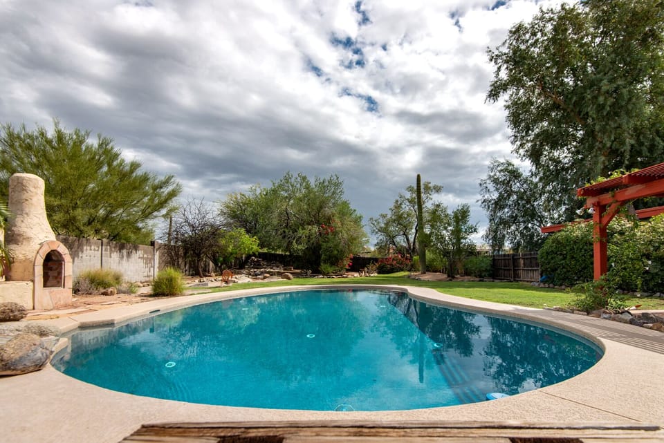 Huge fenced in backyard and deep, refreshing pool