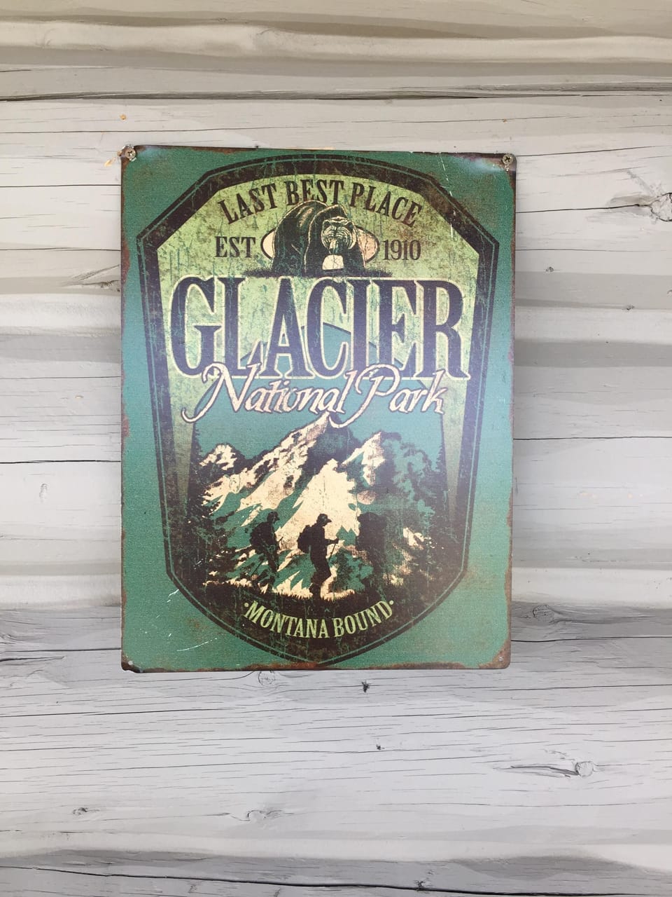 Antique replica metal signs displaying the historic past