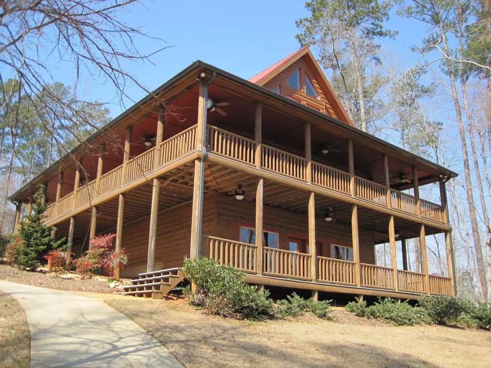 Large wrap around porch and lower deck for enjoying views of the lake