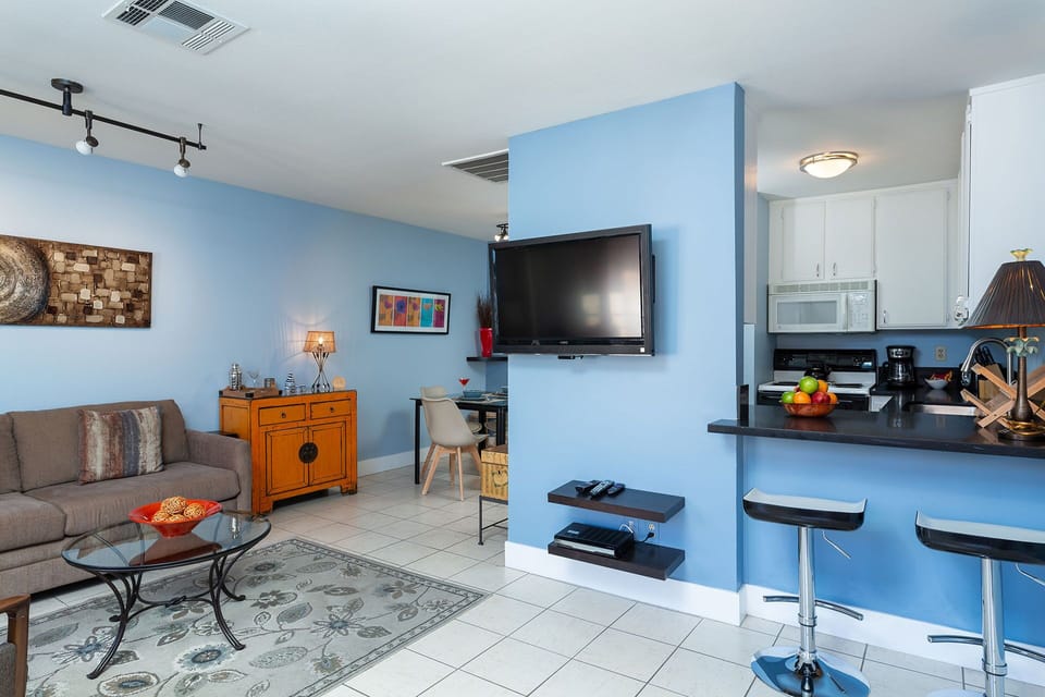 Living area and TV that angles toward living area