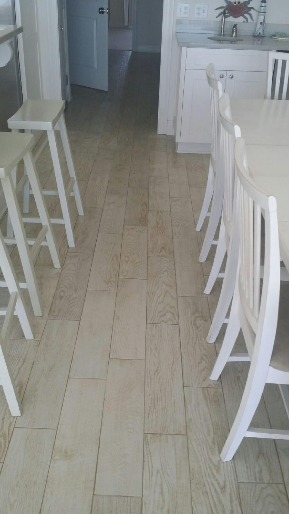 New tile in dining room and hall