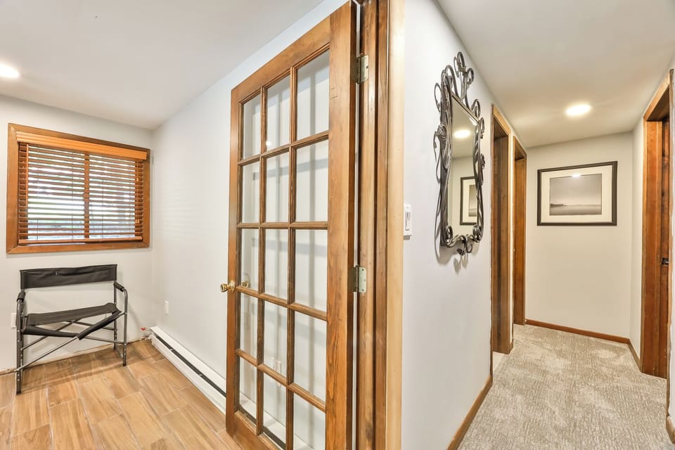 Mudroom (left) Hallway to bedrooms (downstairs)