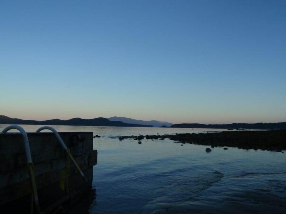 Tide waxing over Welcome Beach at the end of a lovely summer day.