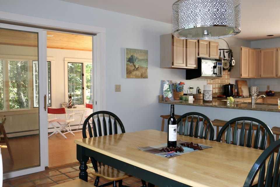 Kitchen with view into sunroom