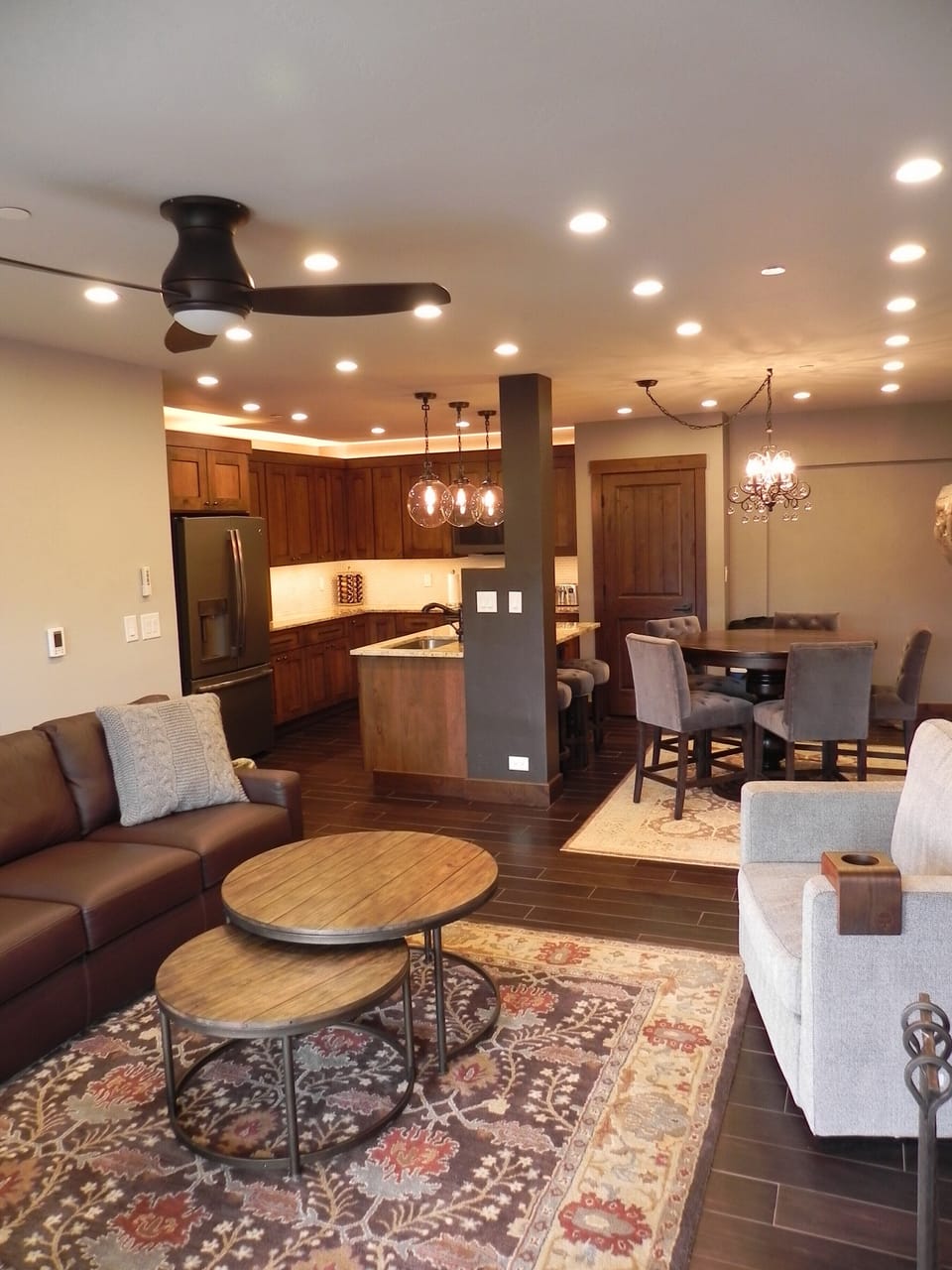 Living room and kitchen - view from the fireplace corner by the balcony