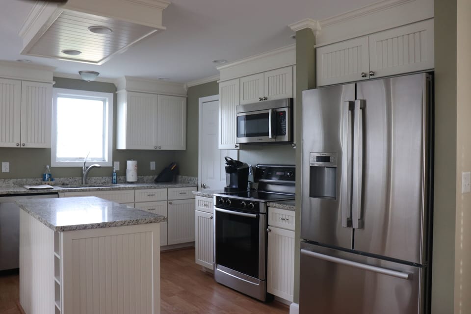 upstairs kitchen with ocean views.