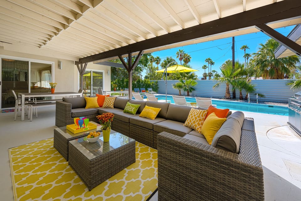 Outdoor lounge area- there is a large wall mounted flat screen tv too!