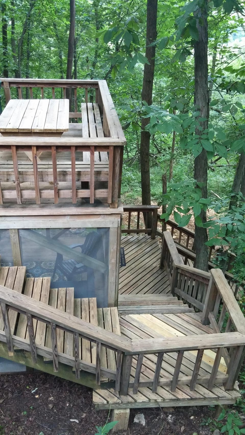 After lunch, stroll down to the screened-in porch with outdoor sectional sofa.