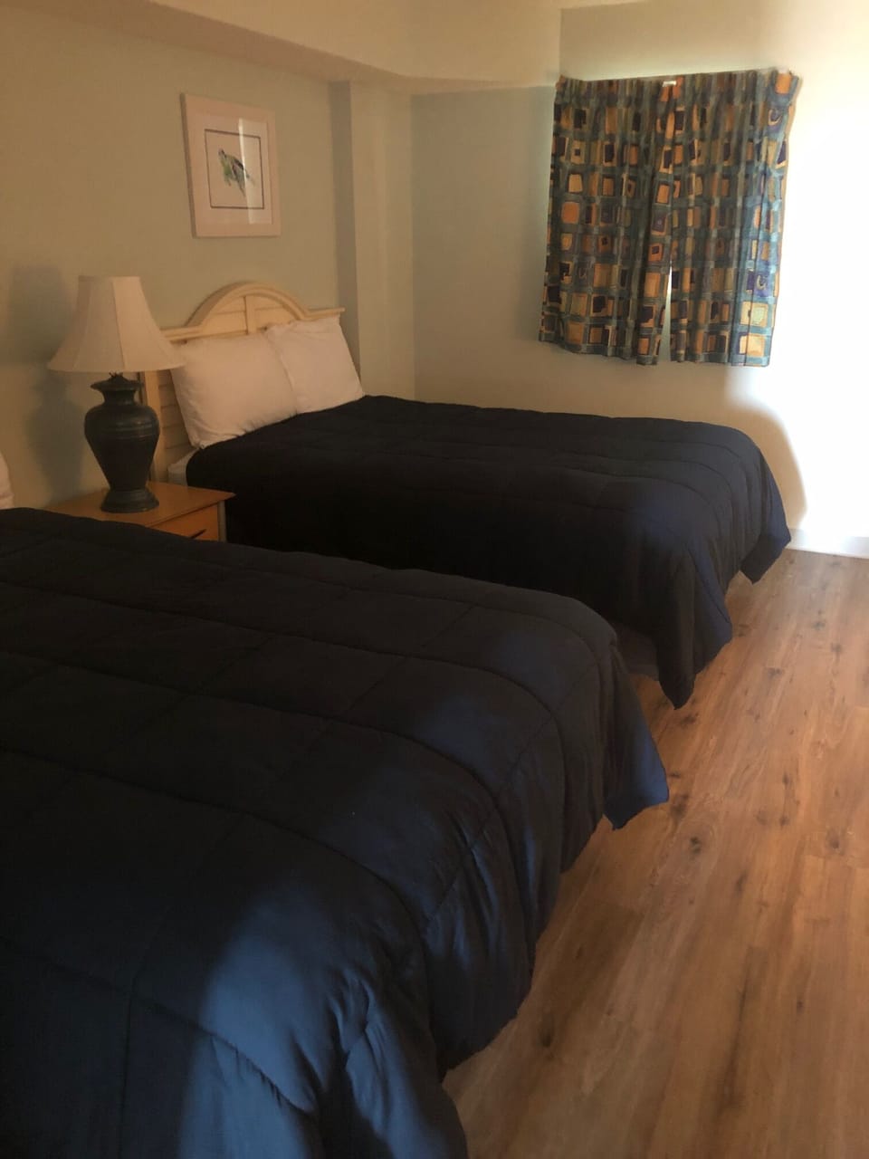 Bedroom has 2 full size double beds and new floors.