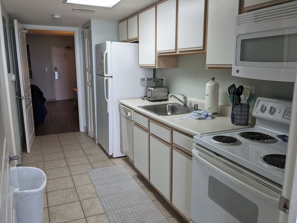 Condo entrance is through the bedroom