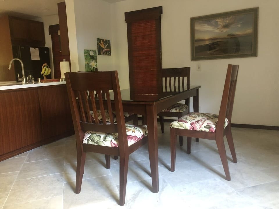 dining room adjacent to kitchen. Comfortably seats 6