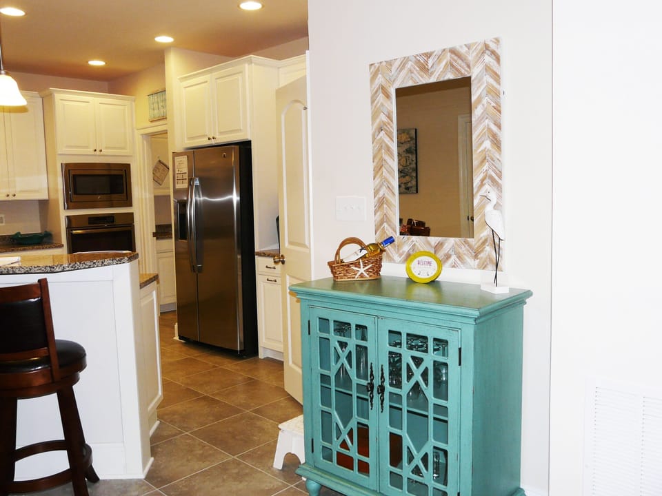 Looking from dining area back towards the kitchen