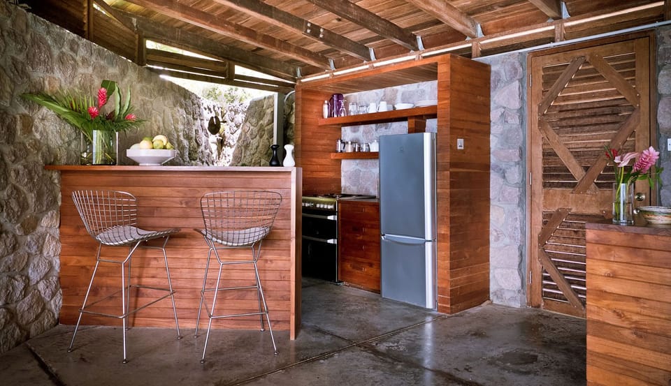 Full kitchen and breakfast bar in The Lodge, Cosmos St Lucia