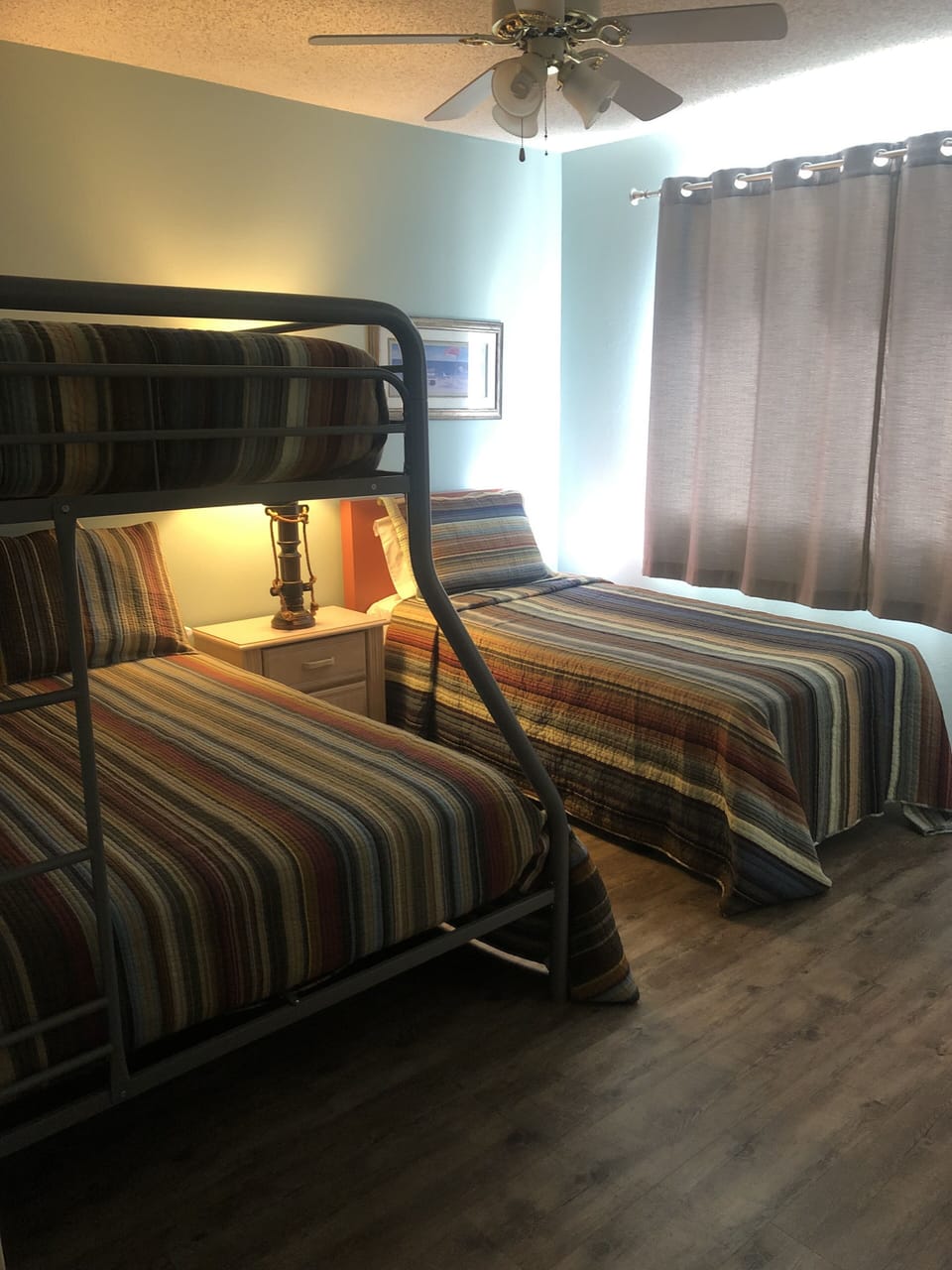 Second bedroom has twin over double bunk bed plus a twin bed!