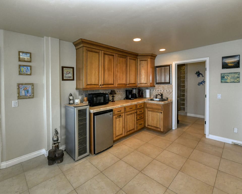beach floor entertaining suite kitchen and private bathroom entrance 