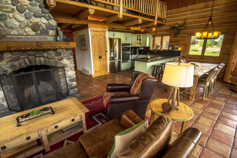 Living room with views of the Yellowstone River and all mountain ranges. 