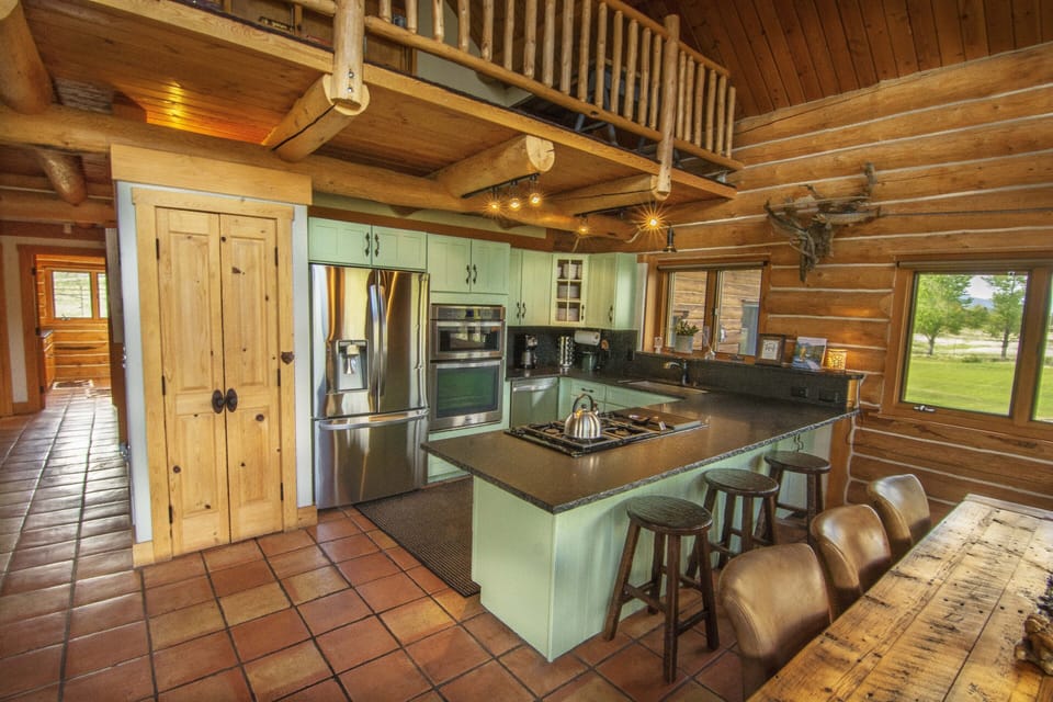 Kitchen with new stainless steel appliances throughout. 