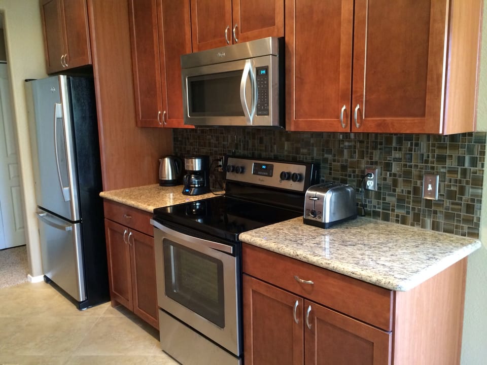 Well-equipped kitchen with stainless steel appliances