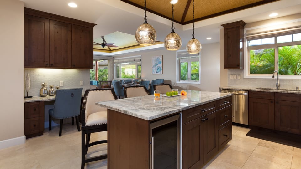 Enjoy the wine fridge, large island and very well equipped kitchen