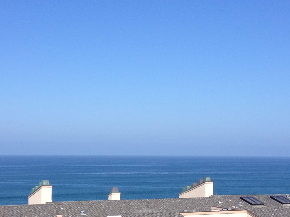 From the Deck there is a 160 degree view of the Ocean (standing or sitting) !