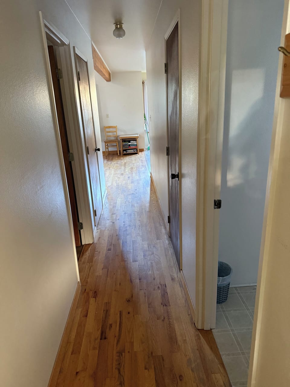 Hallway from entrance of cabin. Downstairs bathroom and bedroom.