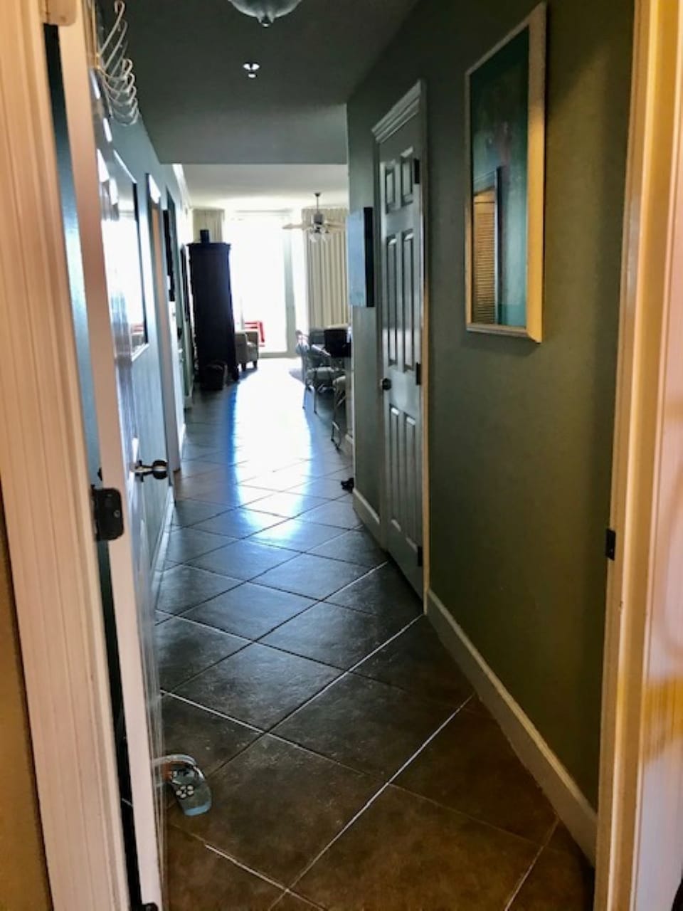 hallway to living and kitchen -- behind the is the lock out suite bedroom