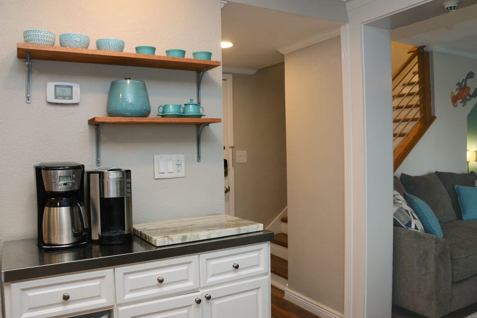 Coffee bar with a set a set of k cups, filters, creamer and sugar provided!