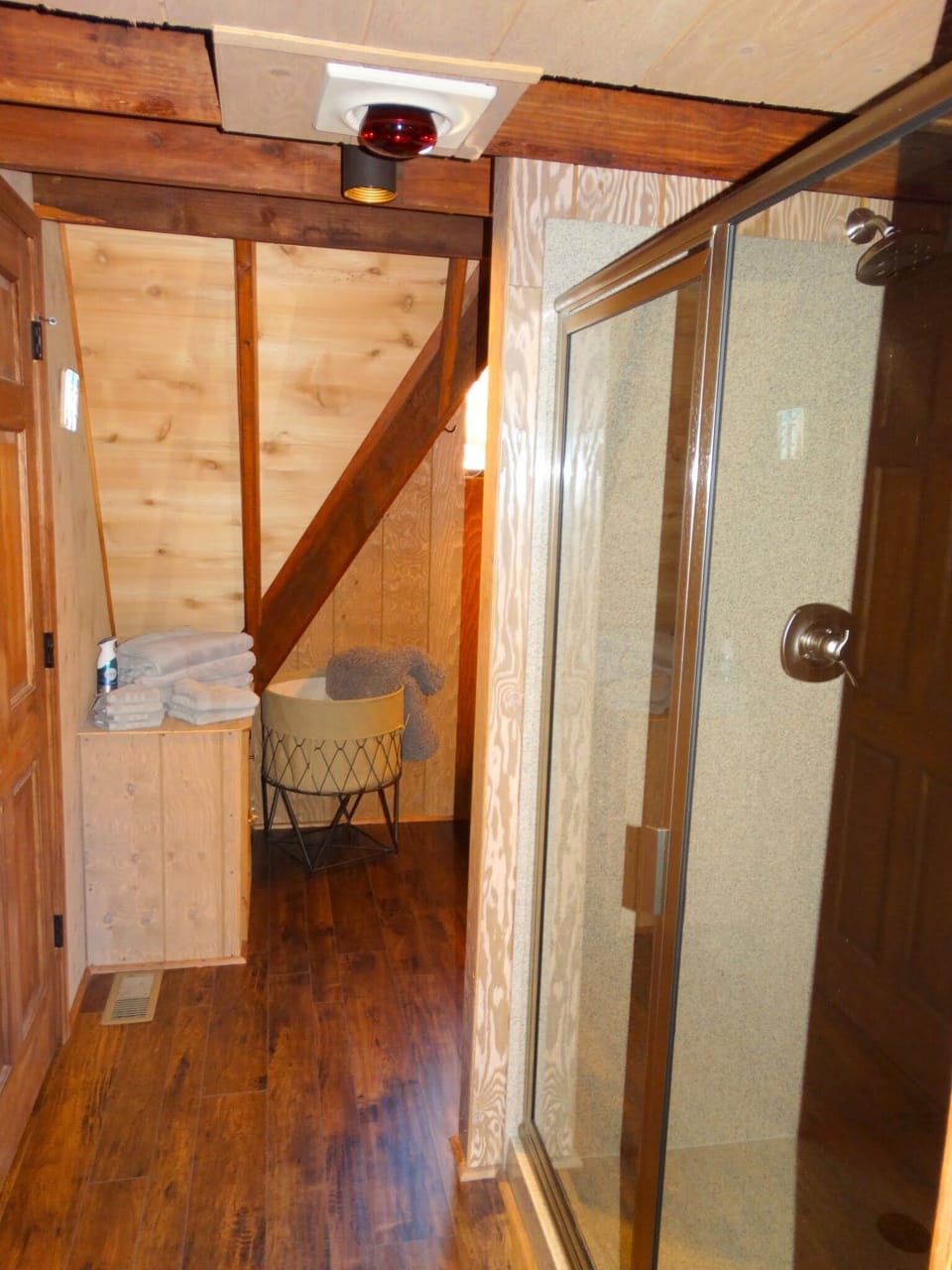 Attached bathroom to first floor bedroom with oversized walk-in shower.
