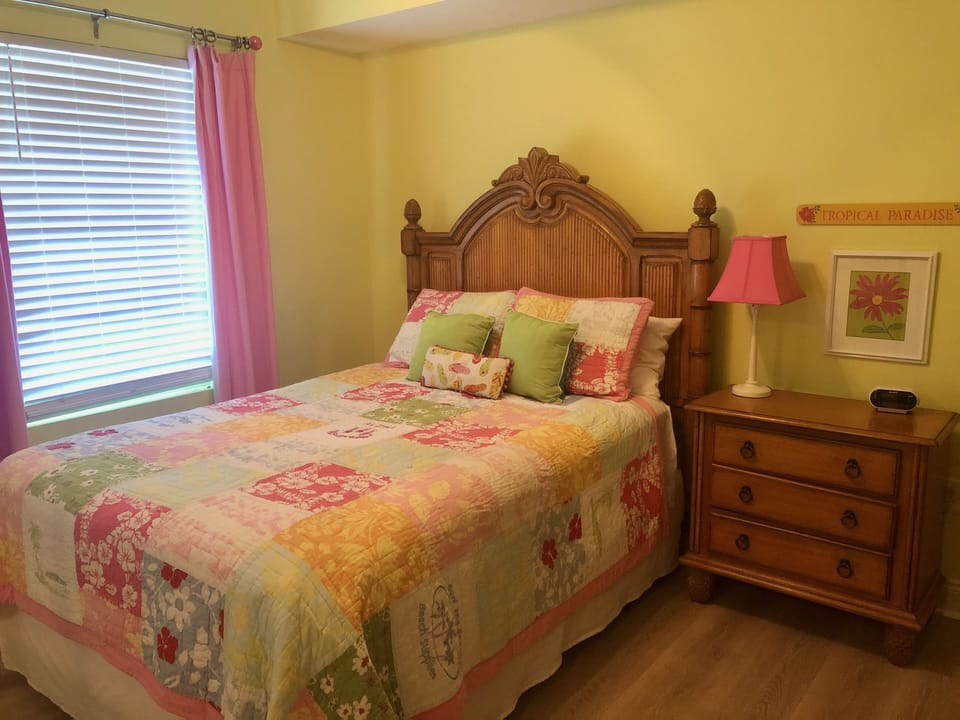 Guest room with a queen size bed and private bathroom, TV/ DVD.