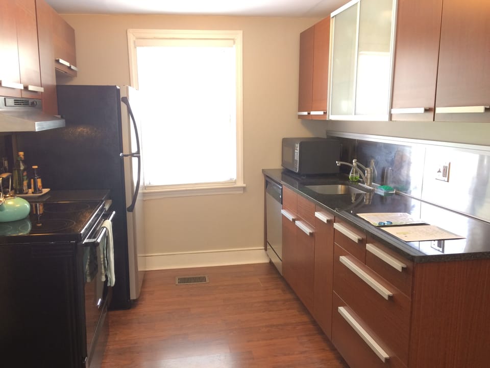 Kitchen is fully stocked for cooking and snacks.