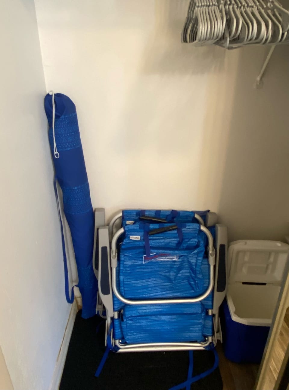 4 beach chairs, 1 umbrella, and wheeling cooler are provided for your use