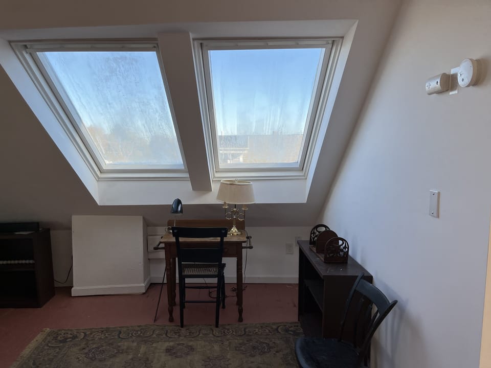 Study or reading area under attic skylights