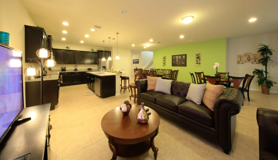 Living Room with leather sofa and  cable TV