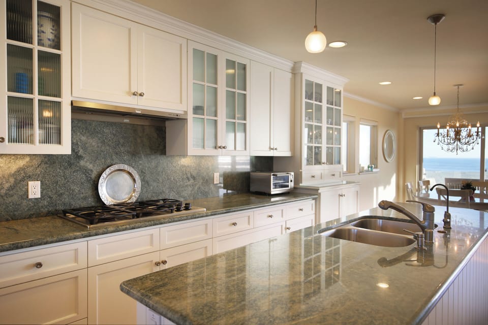 Gas cooktop, double sink, double over, microwave, and dishwasher plus views! 
