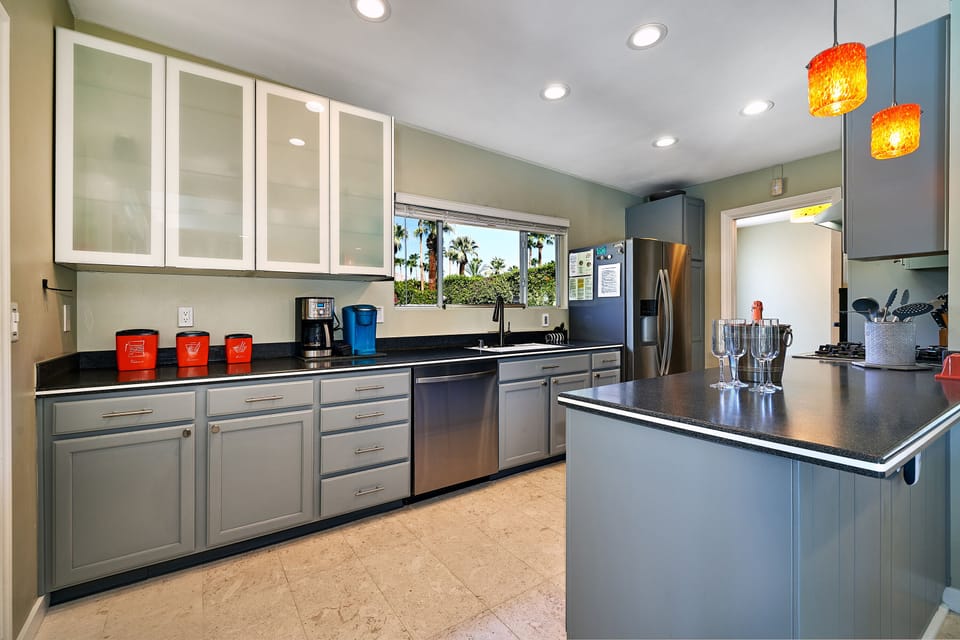 Large, remodeled kitchen with high-end stainless appliances.  