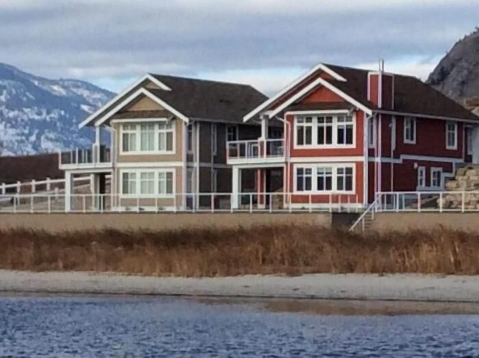 Our red home will inspire you to relax with scenic lake views or play outside. 