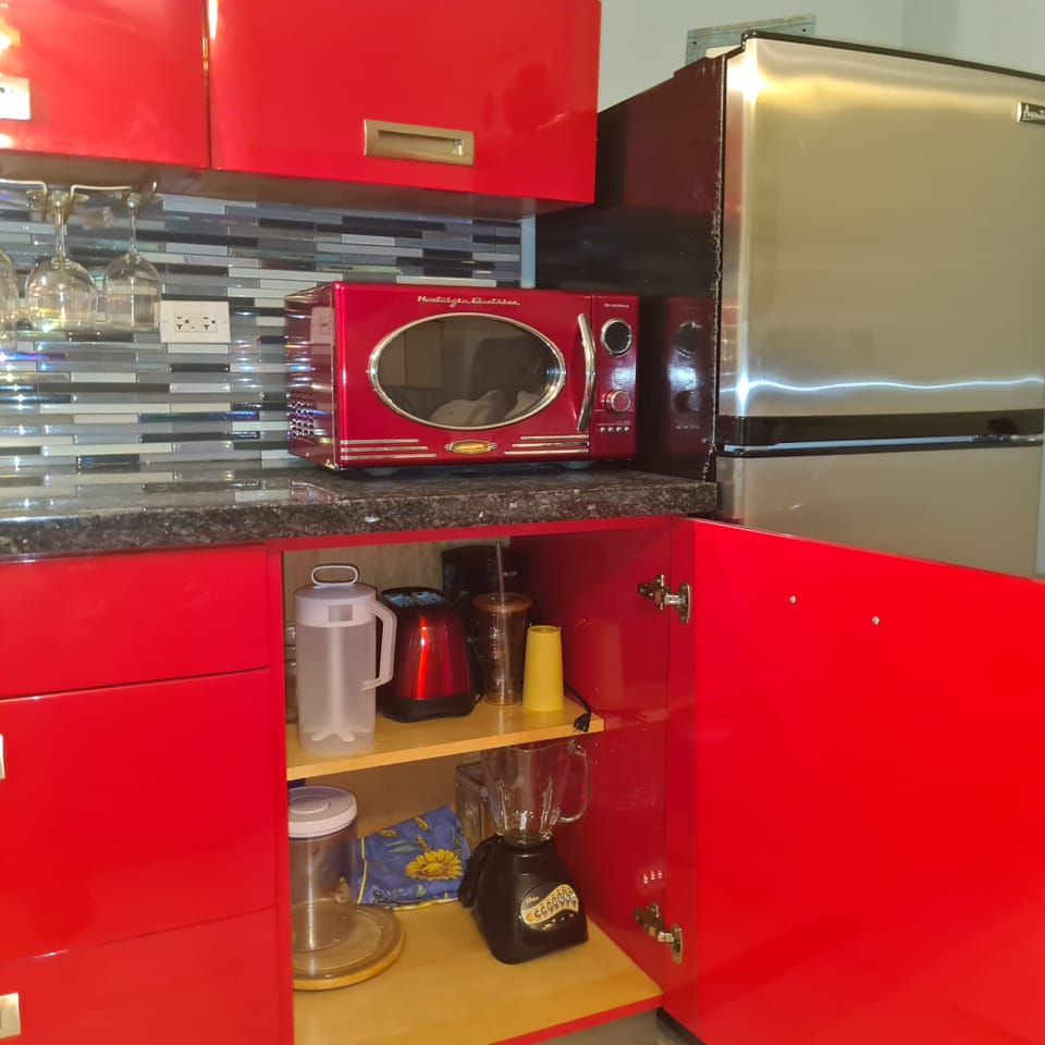 Coffee pot, blender and Microwave Oven