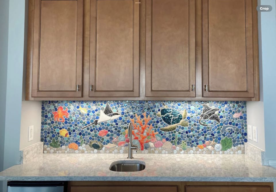 New custom sea life tile mosaic over the bar area.