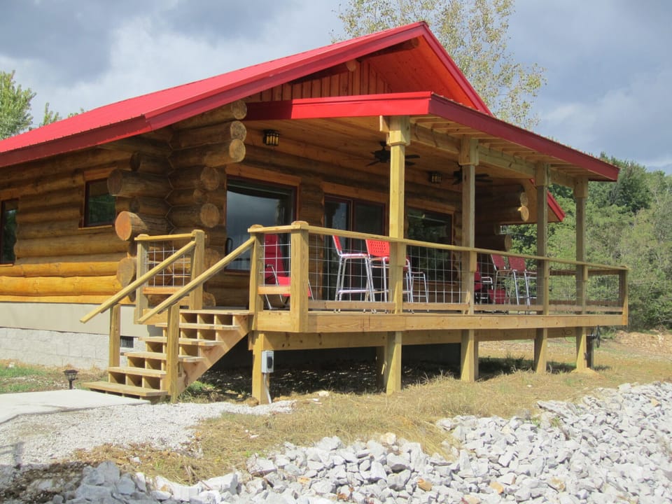 The Eagle's Nest is a handcrafted log cabin overlooking the Ohio River. 