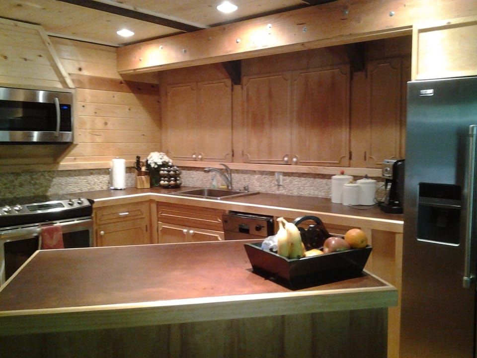 all new appliances and concrete counters