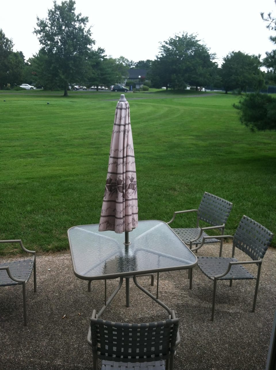 Outdoor Eating Area + First Tee of Golf Course + Walkway to Club House
