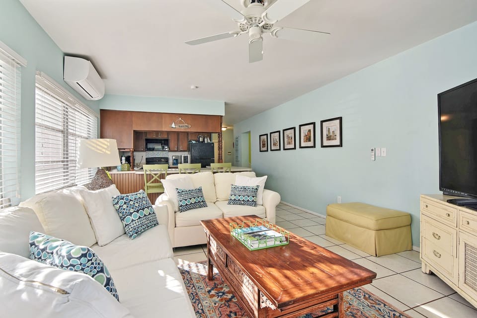 Warm and inviting open concept kitchen and family room spaces.