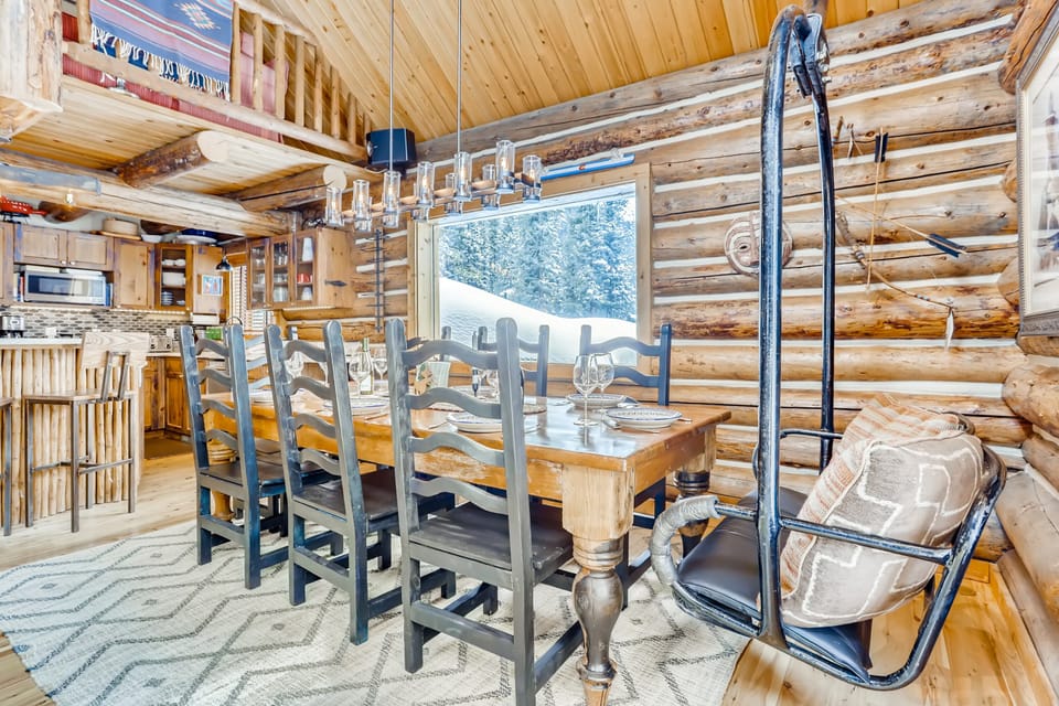 Dining table seats 8.  Authentic A-Basin chairlift at head of the table!  