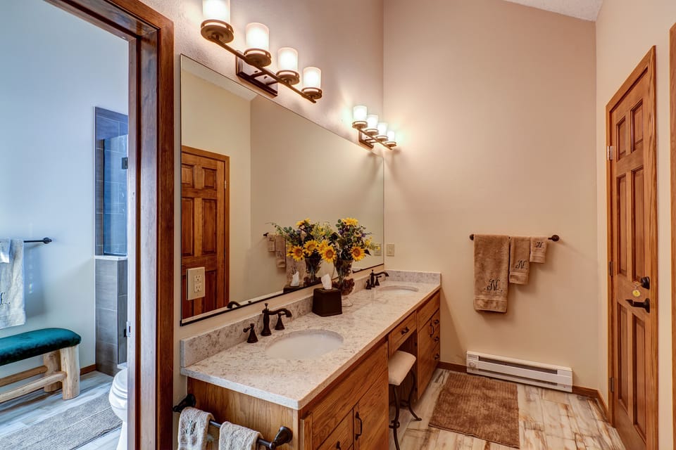 Master suite bathroom with dual vanities vanity 