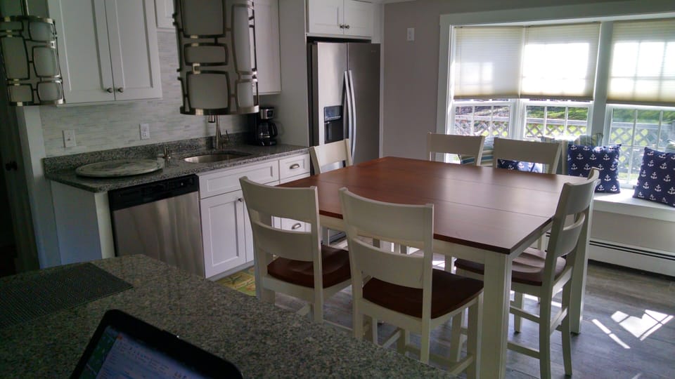 Table seats 8 and island seats 4